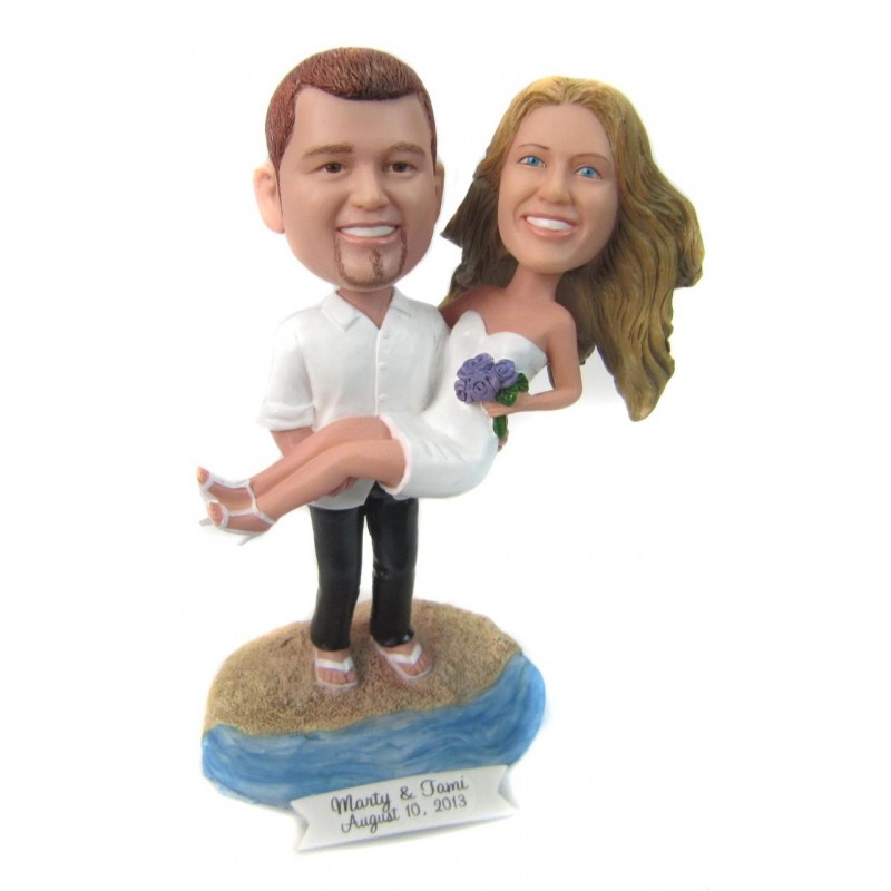 groom and bride beach themed wedding cake toppers