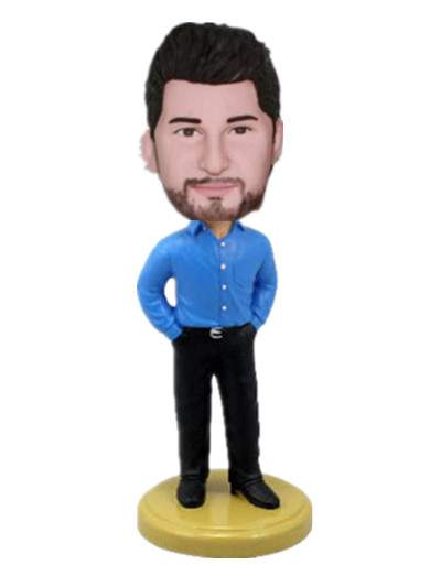 blue shirt hands hands in pockets male bobblehead doll