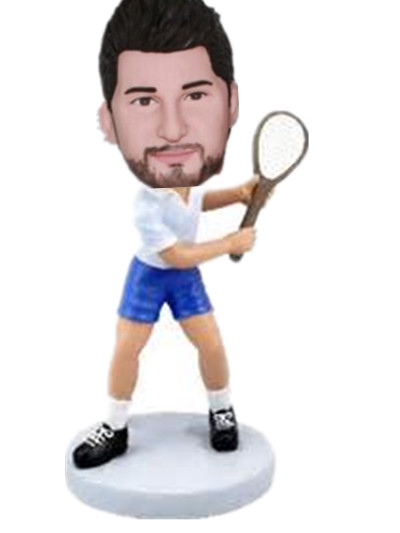 Sport bobble head doll playing tennis