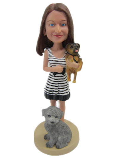 female holding a dog custom bobblehead doll