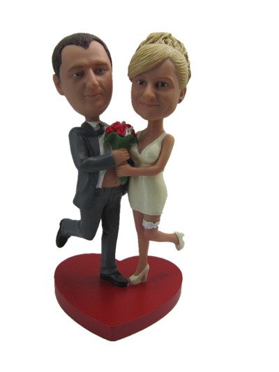 Bobble head doll cake toppers