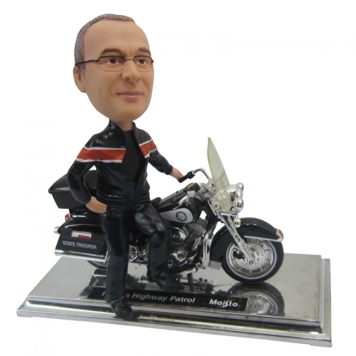 Man with his motorcycle custom bobble heads
