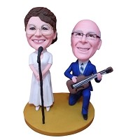 singer couple bobble heads