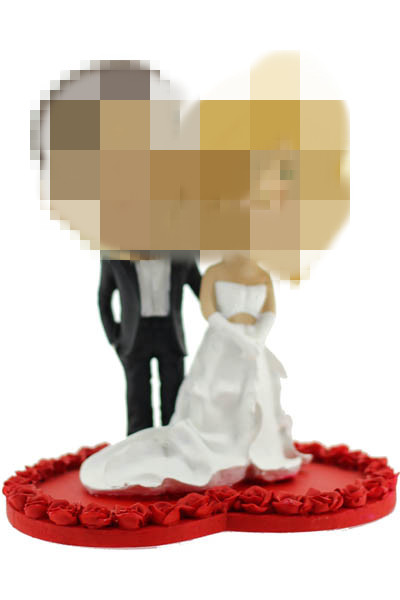 Custom couple bobbleheads