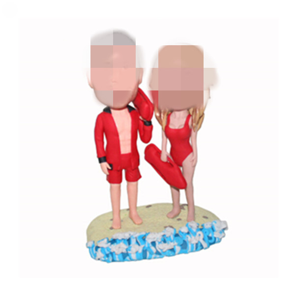 custom couple bobble head doll on beach