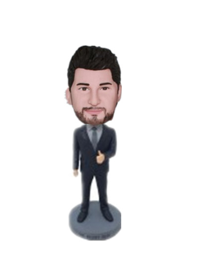boss bobblehead holding the thumb