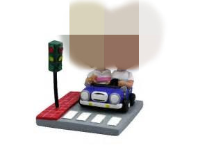 custom bobble heads driving on the road