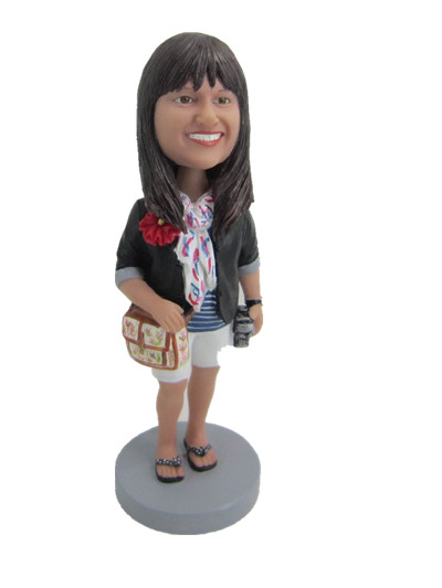 casual girl bobblehead caring a camera