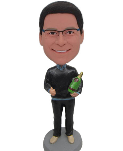 Dashboard bobble head  Man with a big beer bottle
