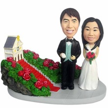 Custom bobblehead wedding cake topper