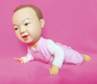 Clay custom personalize  Bobble Head baby laying on the floor gift