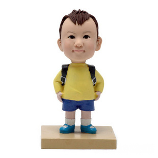 Clay Custom Bobble Head kid with a bag bobbleheads