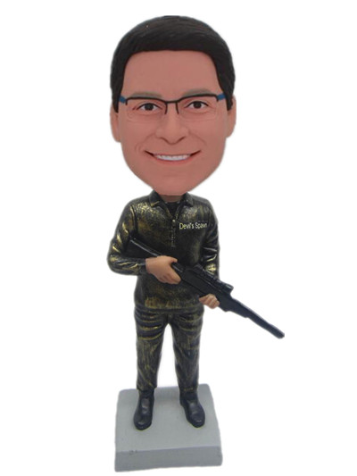 Man With A Gun bobble head doll
