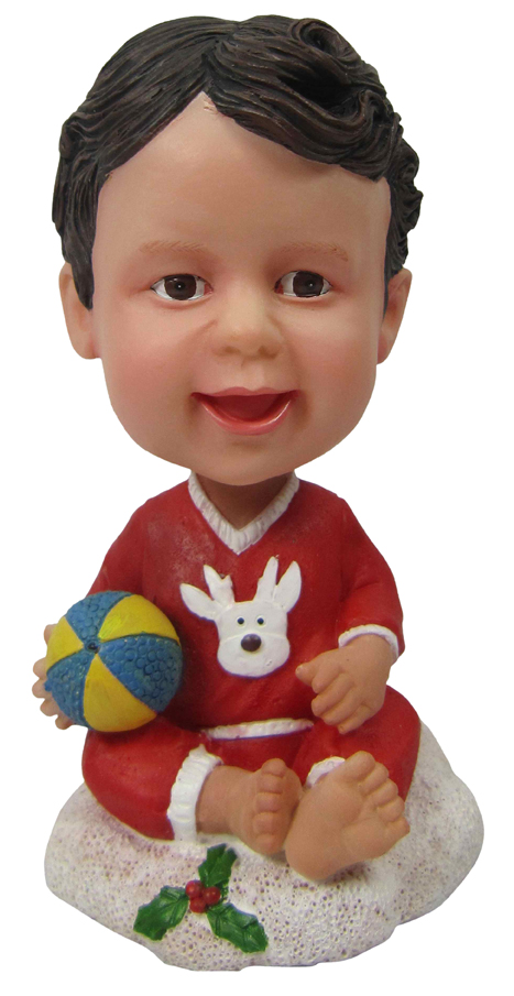 Kid Holding A Ball Bobble Head Dolls