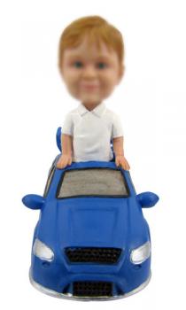 Kid in a car bobble head christmas gift
