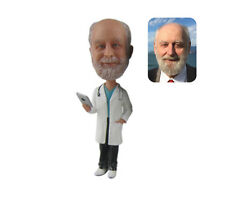 custom male doctor bobblehead holding an iphone